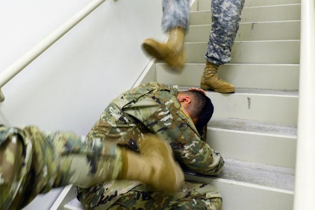 soldiers-kicking-yahoo.jpg